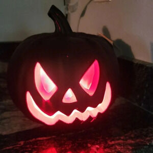 Jack o lantern 8 in tall lighted Black with Pink trim Vintage